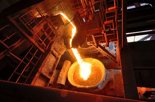 Liquid metal from blast furnace on trail