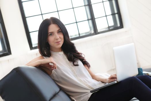 Brunette. Beautiful girl at home