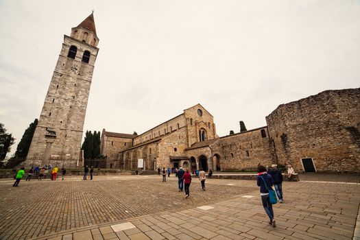 View of Basilica di Santa Maria Assunta and bell tower of Aquileia, Italy. Aquileia is UNESCO World Heritage Site