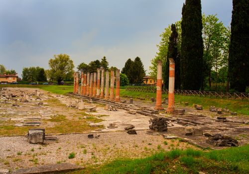 View of columns, Roman ruins on Archeological area of Aquileia in Italy