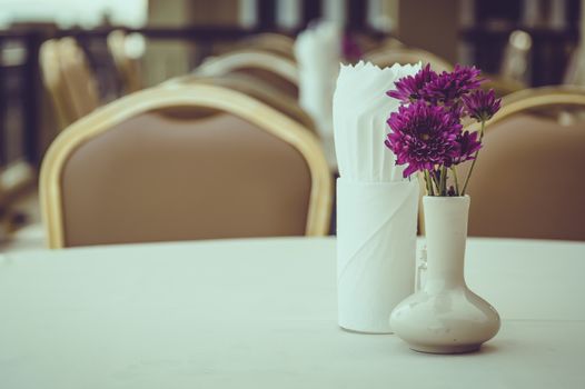 Beautiful flowers in vase on the table