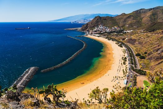 Beach or playa Las Teresitas in Santa Cruz on shore of the Atlantic ocean on Tenerife Canary island, Spain at spring or summer
