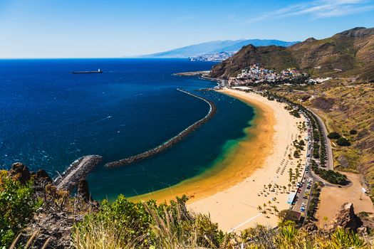 Beach or playa Las Teresitas in Santa Cruz on coast of the Atlantic ocean on Tenerife Canary island, Spain at spring or summer