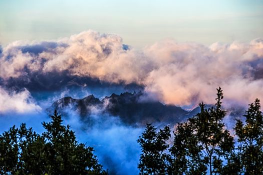 Clouds over mountain and sky horizon landscape in Tenerife island, Spain