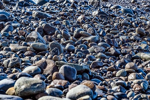 Stones on the beach coast or shore of ocean or sea