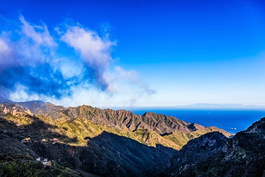 Clouds and mountain with blue sky horizon background near the Atlantic ocean landscape in Tenerife Canary island, Spain