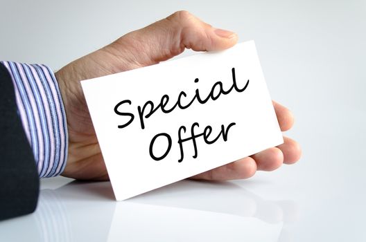 Special offer note in business man hand