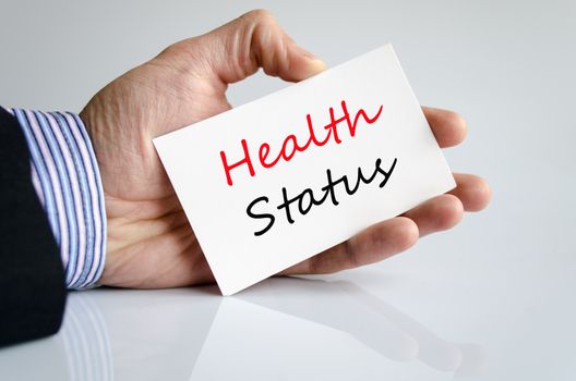 Business man hand writing Health status
