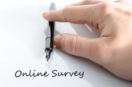 Pen in the hand isolated over white background Online Survey concept
