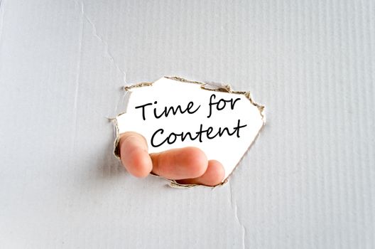 Hand and text on the cardboard background Time for content Concept