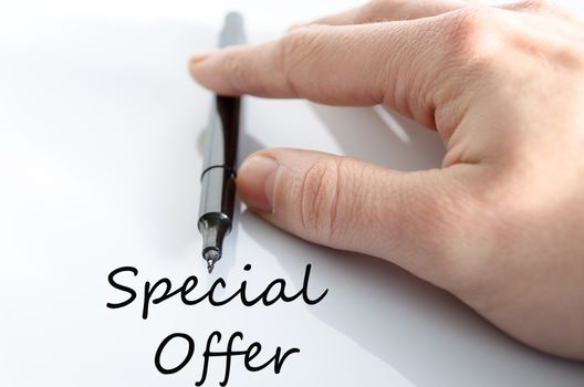 Pen in the hand isolated over white background Special Offer Concept