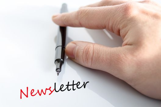 Pen in the hand isolated over white background Newsletter concept
