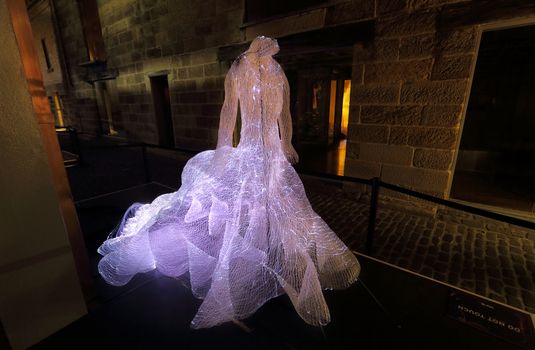 SYDNEY, AUSTRALIA - MAY 26, 2015;  The Dresses shapes hundreds of fibre-optic strands into the form of three beautiful and extravagant dresses. Suspended in darkness, the dresses appear as apparitions, shimmering from the realms of ethereal fantasy.  Artist Tae Gon Kim