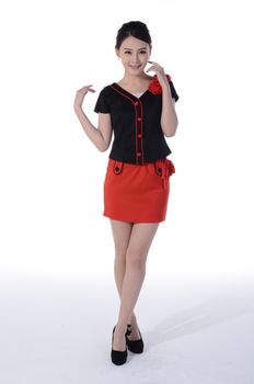 Active girl wear professional attire in front of a white background