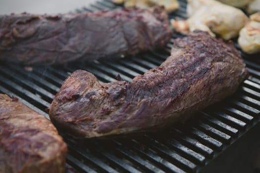 organic beef on the grill. close-up. Shallow DOF.