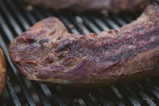 organic beef on the grill. close-up. Shallow DOF.
