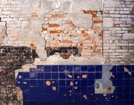 View of old wall with brick and tiles