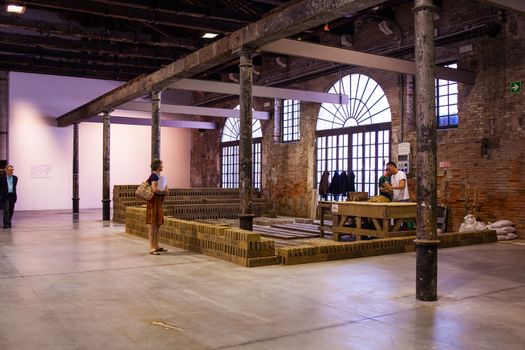 VENICE, ITALY - MAY 06: View of Rirkrit Tiravanija installation intitled "Untitled" showing at Arsenale during the 56th Venice Biennale on May 06, 2015