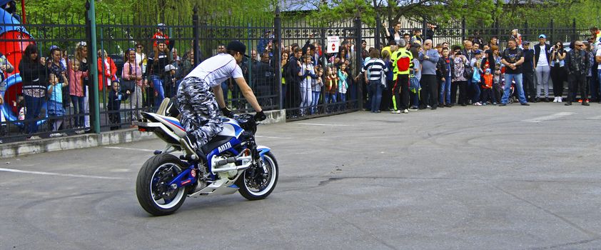 Moto free style pilot stunting on the square - Pyatigorsk, Russia, Opening of moto season 2015 on 1st May 2015