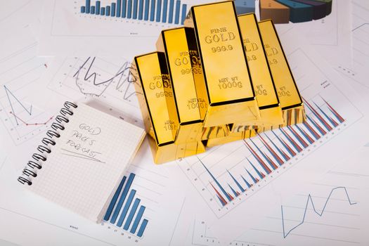 Gold bars and coins, ambient financial concept