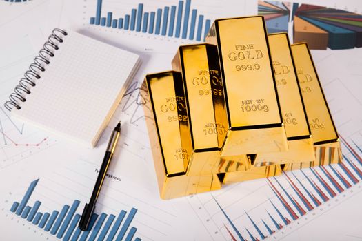 Gold bars and coins, ambient financial concept