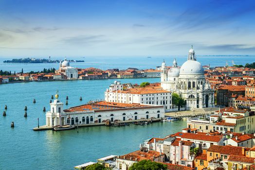 Beautiful view of the Grand Canal and Basilica Santa Maria della Salute in the late evening with very interesting clouds, Venice, Italy 