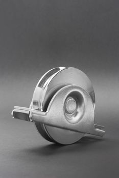 Close up of a pair of bearings used in sliding doors industrial