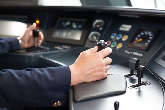 Railroad engineer. Train driver at the workplace.