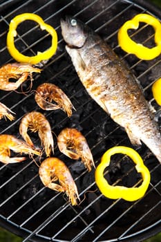Grilling fish, bright colorful vivid theme