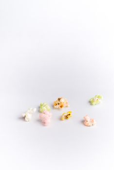 popcorn of many colors on a white background.