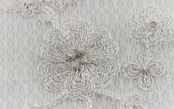 Beautiful lace with flower pattern - macro photo