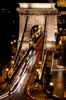 Public transport on the Suspension Bridge at night in Budapest
