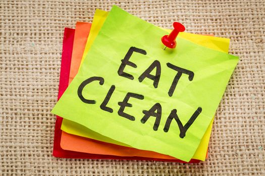 eat clean reminder on sticky note - healthy eating concept