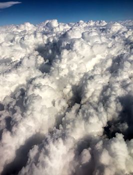 Sky with clouds as seen from airplane.