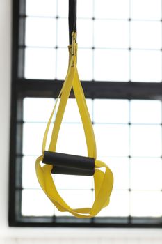 Sport, object. TRX strap in the gym