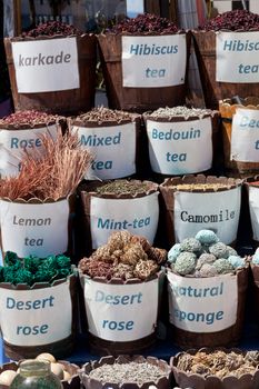 stall on the street with dried leaves 
various kinds of tea