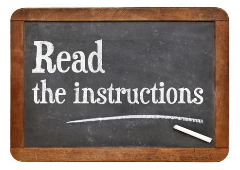 Read the instructions advice on a vintage slate blackboard