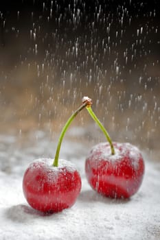cherry with sugar on old table