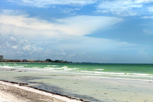 Siesta Key Beach is located on the gulf coast of Sarasota Florida with powdery sand. 