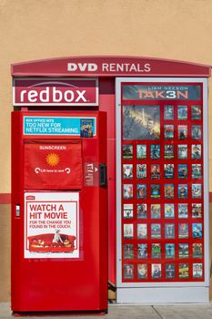 SANTA CLARITA, CA/USA - MAY 31, 2015: Redbox DVD rental machine. Redbox specializes in DVD, Blu-ray, and video game rentals via automated retail kiosks.