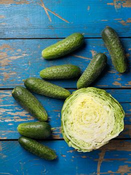 Fresh adn ripe green cabbage and cucumber
