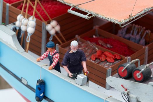 Closeup details of classical Danish scale model fishing boat                               