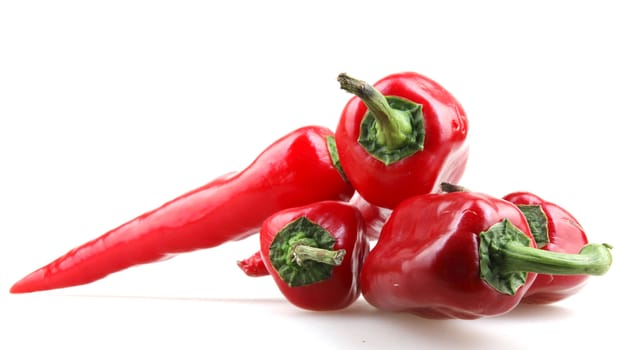 Red peppers on white background