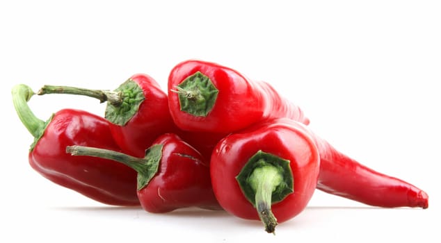 Red peppers on white background