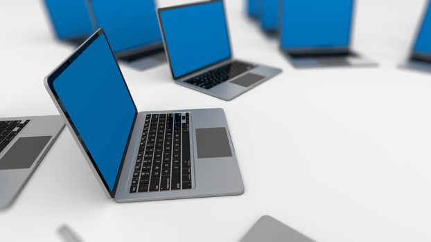 3d render of a lot of laptops in a row. Shallow Depth of field.