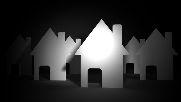 Close up of paper houses on black background