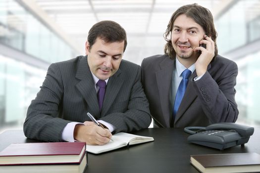 business team working at a desk, at the office