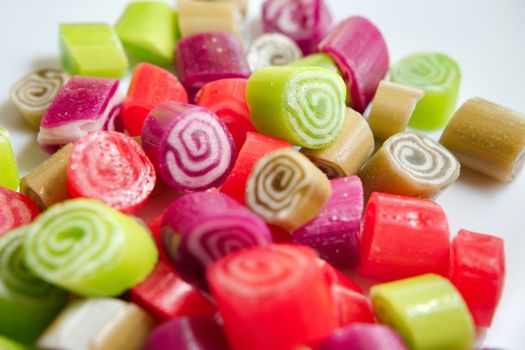 Colorful candies on white background