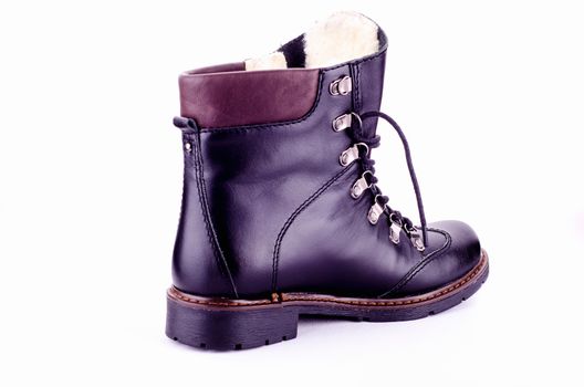 Womens leather boots in black on a white background