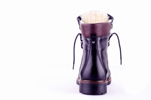 Womens leather boots in black on a white background